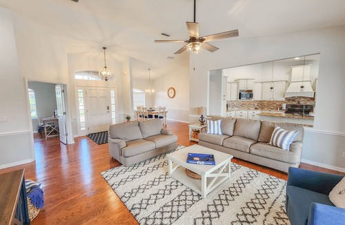 Palm Harbor House | Waterfront Pool Home | Dock | Game Room | King Bed