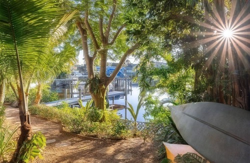Palm City House | Waterfront Pool HotTub Kayaks Firepit