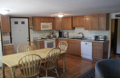 Sunapee House | Waterfront property on pond with private dock .