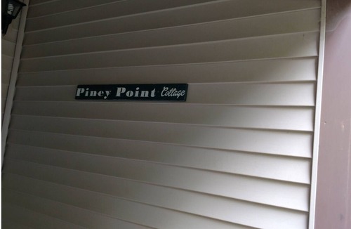 Sunapee House | Waterfront property on pond with private dock .