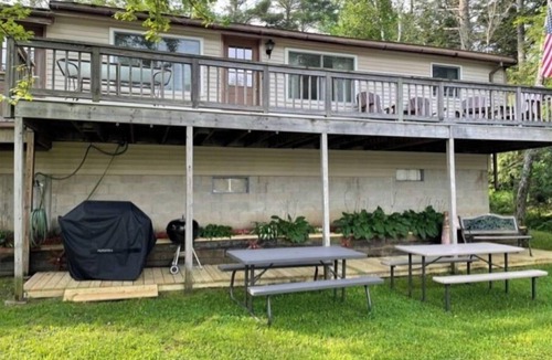 Sunapee House | Waterfront property on pond with private dock .