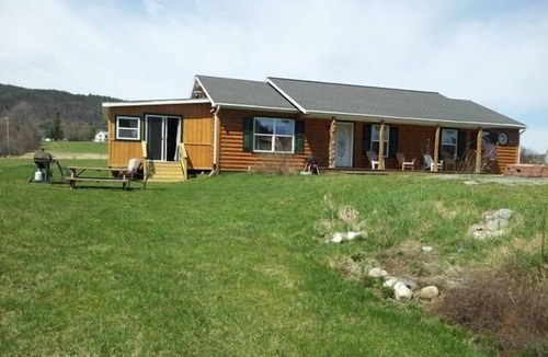 North Lake George Cottage | Waterfront Ranch with Dock and private recreational area on Lake George Sleep 10