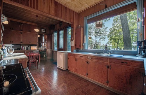 Frontenac House | Waterfront Retreat on Round Island with boat dock