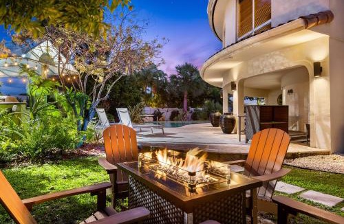 Oakland Park House | Waterfront Retreat: 7BR Villa with Pool Firepit