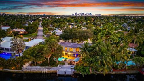 Oakland Park House | Waterfront Retreat: 7BR Villa with Pool Firepit