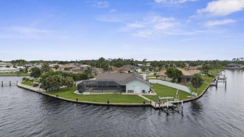 Gulf Cove House | Waterfront Retreat with Pool Hot Tub and Dock Access