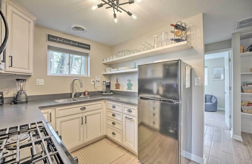 Syracuse Cottage | Waterfront Syracuse Home w/Patio & Fire Pit!