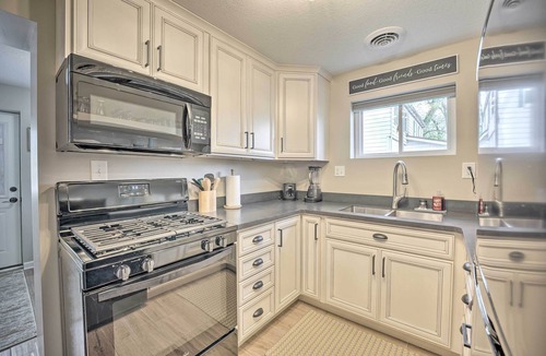 Syracuse Cottage | Waterfront Syracuse Home w/Patio & Fire Pit!