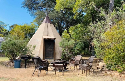 Seguin RV Rental | Waterfront Teepee 0 - Bird Sings