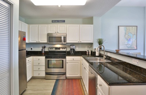 Madeira Beach Condo | Waterfront Top Unit w/Marina. Across from the Beach. Spacious w/2 Private Balconies, Pool & Hot Tub