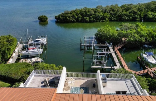 Tierra Verde House | WATERFRONT TOWNHOME WITH BOAT SLIP, ELEVATOR, & POOL! PET FRIENDLY!