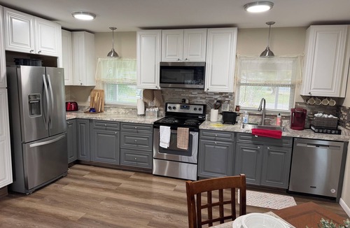 Tavares House | Waterfront Views from Inside Home, Screened Porch & Private Deck