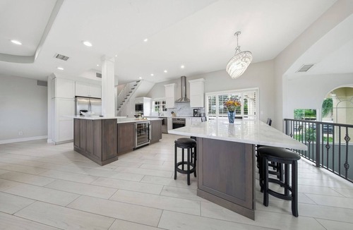 Palm Harbor Villa | Waterfront Villa Pool Balcony + Game Room