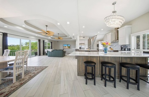 Palm Harbor Villa | Waterfront Villa Pool Balcony + Game Room