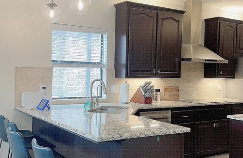 Walden on Lake Conroe Villa | Waterfront villa w/pool, hot tub, outdoor kitchen.