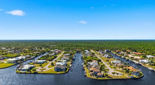 Gulf Cove House | Waterfront Villa w Pool, Dock and Gulf Access