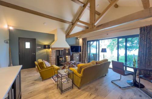 Wing House | Waters Edge, Talkin Tarn, a luxurious bungalow with stunning views over the tarn