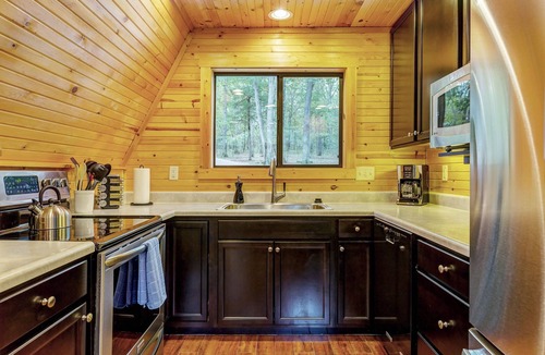 Wright City Ski Chalet | Waterside Cottage by Sarah Bernard with Firepit, Private Dock, and Hot Tub