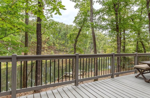 Wright City Ski Chalet | Waterside Cottage by Sarah Bernard with Firepit, Private Dock, and Hot Tub