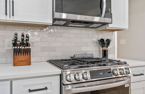 Russells Point House | Waterside Haven + Hot Tub l Fire Pit