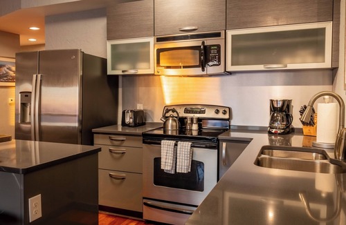 Waves Condo | Waves OBX 2BR Garden View Suite - Full Water Launch Access + Gear Storage