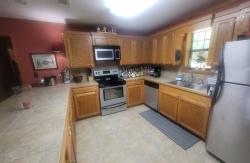 Acme Cottage | Weekend getaway at scenic Black River Lake with floating dock and boathouse.