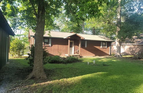 Acme Cottage | Weekend getaway at scenic Black River Lake with floating dock and boathouse.