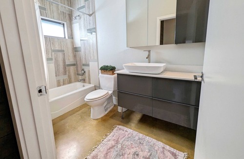 MLK House | Welcome to East Austins Cactus House! Private Stock Tank Pool + Hot Tub