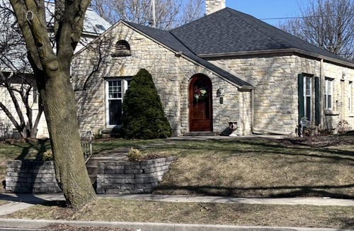 Milwaukee House | Welcome to the Charming Stone Haven, a beautiful three bedroom property.
