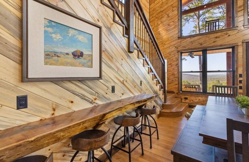 Antlers Cabin | Welcome to The Sanctuary, a peaceful mountain retreat designed for connection, comfort, and unforgettable views. From cozy fireplaces to expansive outdoor spaces overlooking White Rock Mountain.