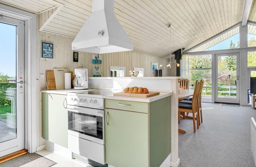 Lyngsbæk Strand House | Welcome to this very well maintained cottage with good terraces and a large lawn.