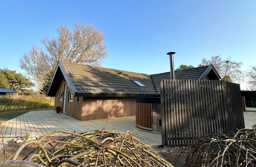 Skovmose Cottage | Welcome to your holiday retreat – relaxation and coziness await!