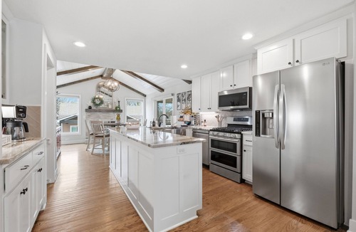 Lee's Summit House | Welcome to your luxury Lee’s Summit getaway—a high-end 4-bedroom, 3-bath home designed for comfortable group stays with a true “vacation mode” backyard. Each bedroom has its own Roku TV, ready for you to log in with your credentials.