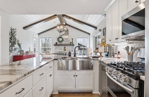 Lee's Summit House | Welcome to your luxury Lee’s Summit getaway—a high-end 4-bedroom, 3-bath home designed for comfortable group stays with a true “vacation mode” backyard. Each bedroom has its own Roku TV, ready for you to log in with your credentials.