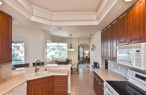 Long Meadow House | Welcoming 3-bedroom water front house with heated pool Rotonda West