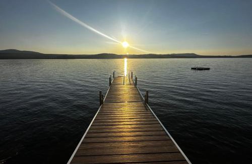 Lyon Mountain House | Well-appointed Adirondack cabin directly on 9-mile lake