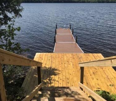 Lyon Mountain House | Well-appointed Adirondack cabin directly on 9-mile lake
