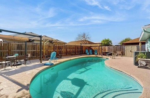 South Side House | Well-appointed home with a pool, children's items, fireplace, washer/dryer, & AC