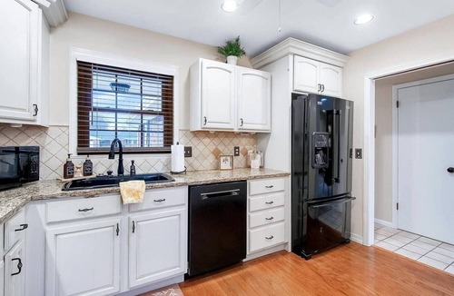 Wichita House | West-Side Ruby: Hot Tub, King Beds, Arcade, Pool Table