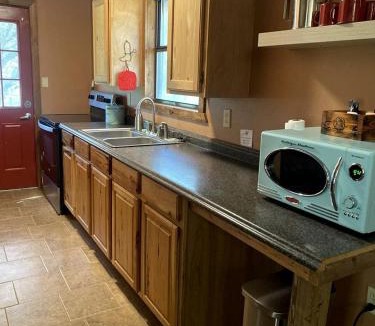 Paluxy House | Western-Themed Cabin with Hot Tub, Fireplace & Pool Access near Meadow Retreat in Texas