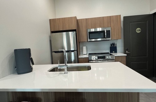 Grand Island Condo | Where the Lights Glow Downtown Condo