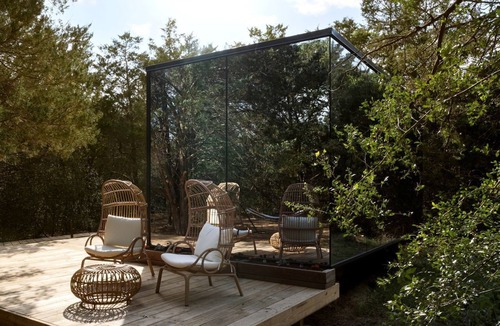 Bastrop Cabin | Whimsical Flower-Inspired Mirror Cabin by the Lake in the Enchanted Forests of Texas