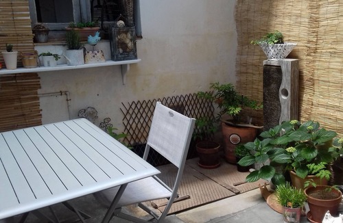 Bauge House | White room with private shower room and WC