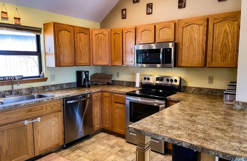 Warsaw House | Whole house on a quiet cove, Lake of the Ozarks, Family owned and operated.