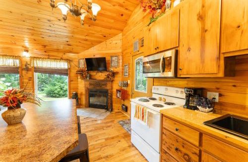 Bryant House | Wildflower Cabin with a private hot tub