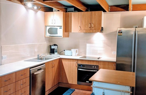 Berridale Apartment | Winter hideaway loft style unit with Fireplace, Billiard table and Bath.