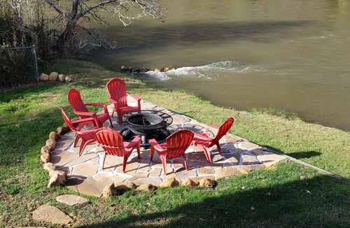 Murphy House | Winter in the mountains, fishing by the fire pit. Murphy and the Casino nearby.