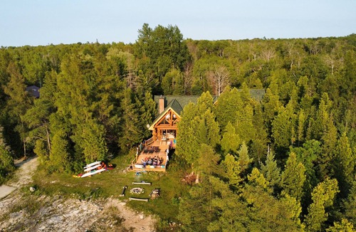 Lion's Head Cottage | Wishbone Retreat. Waterfront. Lion's Head. 6-Bedroom Custom Log Home