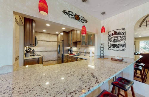Carefree Condo | Wonderful condo with pool, fireplace, W/D, & grill - golf nearby