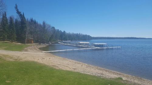 Oslund House | Wonderful Home on Sand Lake w/Expansive Porch!